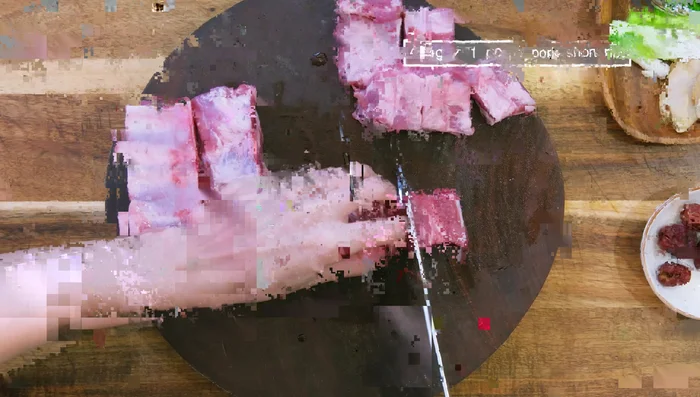 Ask the butcher to cut the pork ribs into 1-inch thick strips. Slice between the bones to separate the ribs.