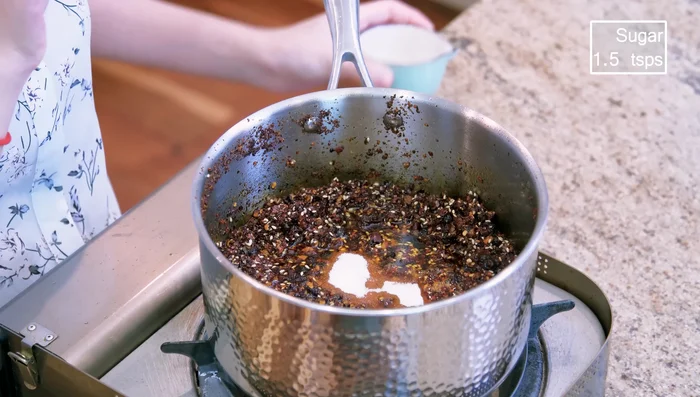 Adjust flavor with sugar and soy sauce (and MSG, if desired). Taste and adjust seasoning as needed.