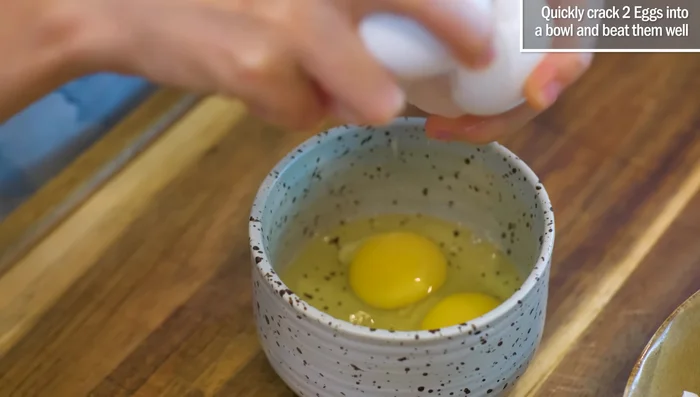 Cook eggs: Preheat wok until smoking hot. Add pork lard, swirl, and pour in eggs. Cook for 30 seconds, remove and set aside.