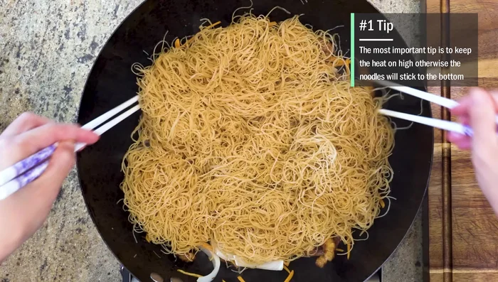 Add noodles: Add rice noodles and stir-fry over high heat to prevent sticking.