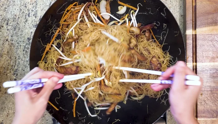 Add bean sprouts and chives: Add bean sprouts and chives at the end (they only take 20 seconds to cook).
