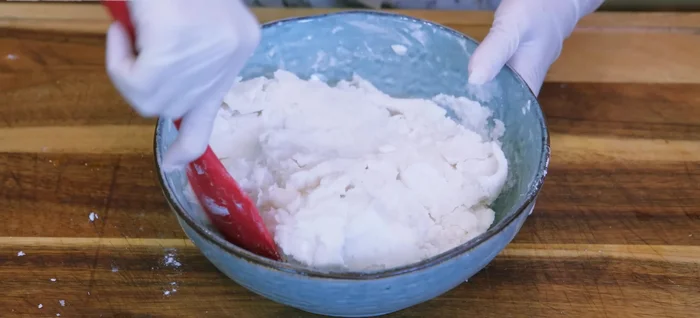 Let the dough cool to lukewarm (10-15 minutes). Knead until smooth and nonstick, adding more flour or water as needed.
