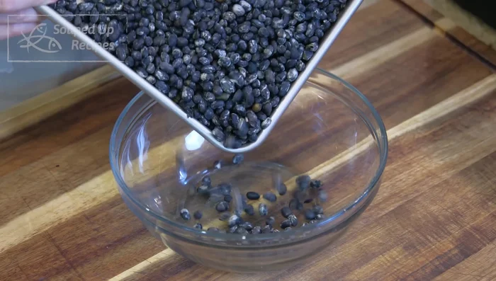 Transfer the beans to a mixing bowl.