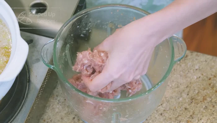 Form meatballs by hand or using a spoon, carefully dropping them into the simmering stock. Dip your spoon in the stock between each meatball to prevent sticking. Do not add meatballs to boiling water.