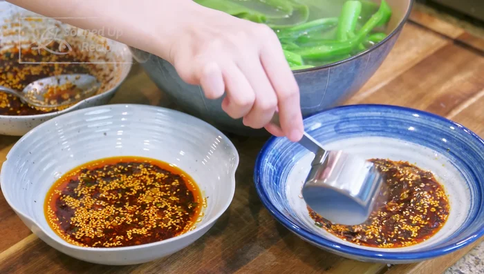 Transfer noodles and vegetables to a bowl. Add some noodle cooking water (3/4 cup total, added in batches) to each serving of dipping sauce to adjust consistency and taste. It should be saltier than usual.