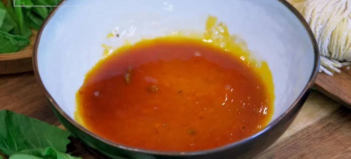 Place noodles in bowls, top with beef braising broth, noodles, and beef.
