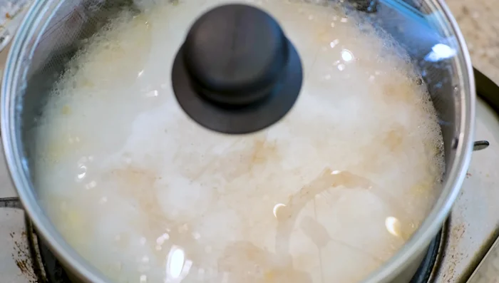 Once bubbling, reduce heat to low, cover, and simmer for 20 minutes. Check the texture; they should be easily crushable.