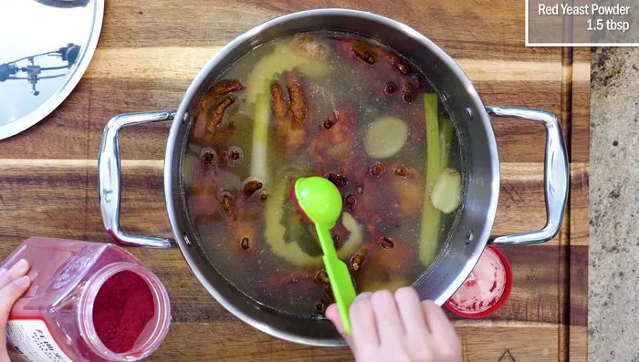 Combine and soak: Add the fried chicken feet to the sauce. Optional: Add red yeast rice powder. Soak for about 2 hours.