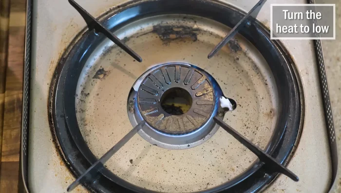 Heat the flour mixture over low heat, stirring constantly. The mixture will initially appear unchanged. After 4-5 minutes, starch will begin to form at the bottom.