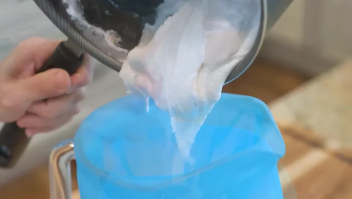 Immediately transfer the mixture into the prepared piping bag. Do this quickly – the window for the perfect consistency is only about 30 seconds.