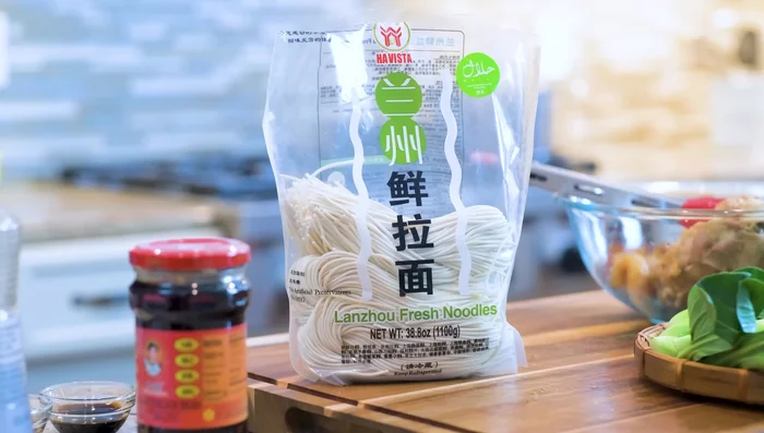 Add noodles (fresh noodles need a few minutes, dried noodles longer; adjust according to package instructions).