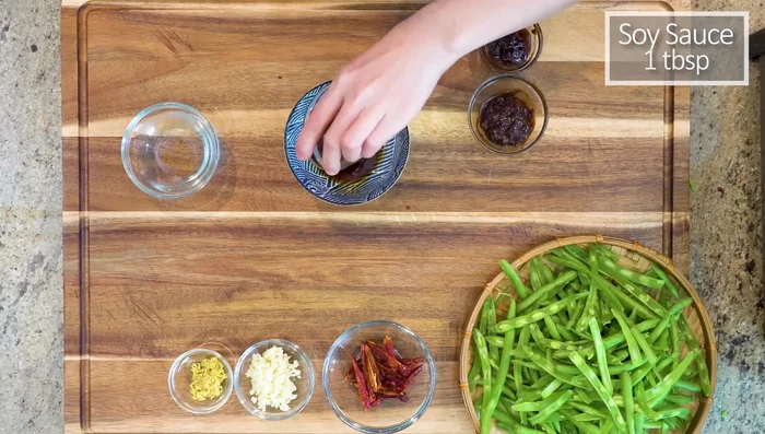 Make the sauce: Mix soy sauce, soybean paste, oyster sauce, and water.