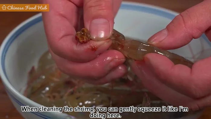 Clean the shrimp: Gently squeeze the shrimp to remove the shrimp line. Separate the head from the body (save the heads for shrimp oil).