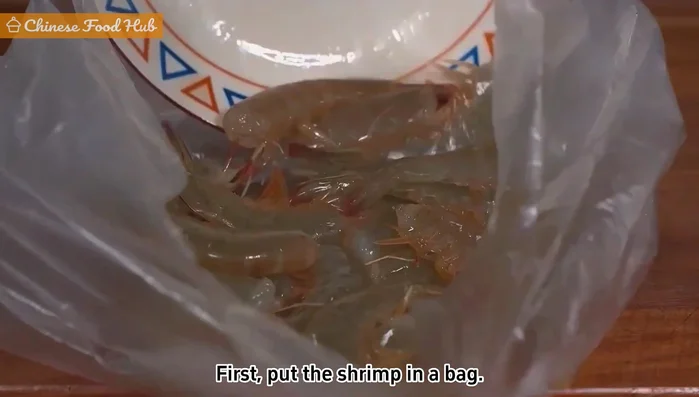 Freeze the shrimp: Place shrimp in a bag, tie tightly, and freeze for 1 hour.