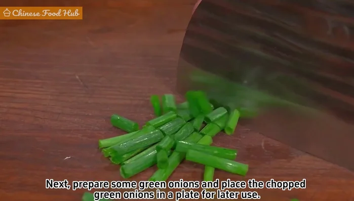 Prepare green onions: Chop green onions and set aside.