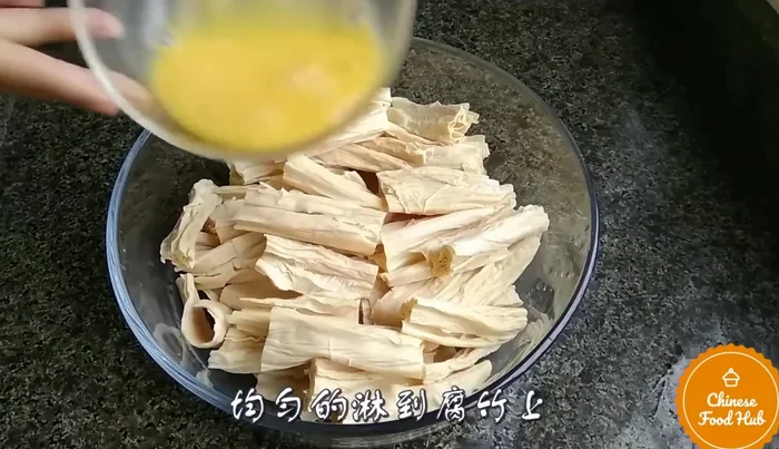 Season the beancurd sticks as preferred.