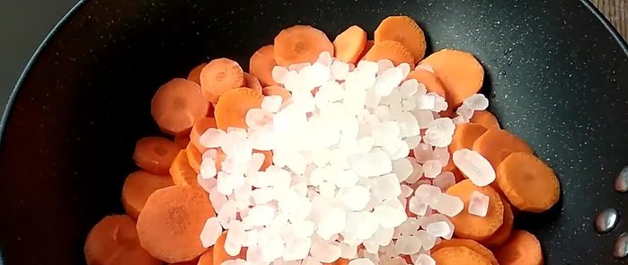 Candy the carrots: Add the prepared carrots to the boiling sugar syrup. Reduce heat to a simmer and cook until the carrots are tender and translucent.