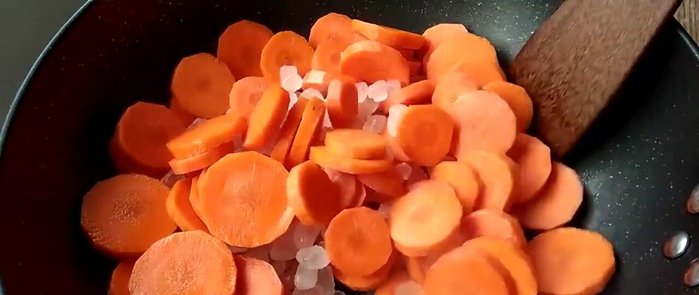 Dry the carrots: Remove the candied carrots from the syrup and let them cool slightly. Arrange them on a baking sheet lined with parchment paper and let them dry.
