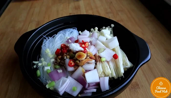 Add the clams and stir-fry for a while.