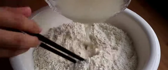 Make the dough. Mix flour, water, yeast, and sugar to form a smooth dough. Let it rise.