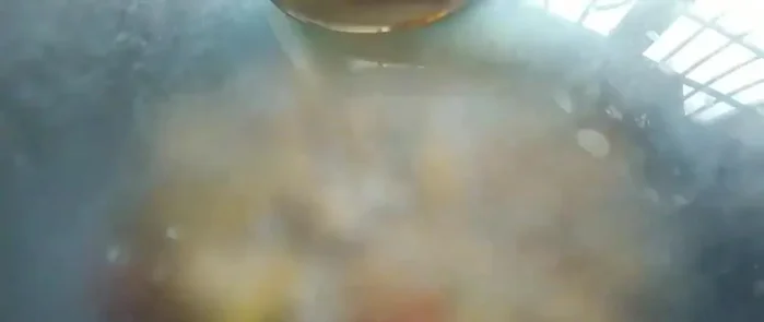 Reduce heat and simmer until the chicken is cooked through.