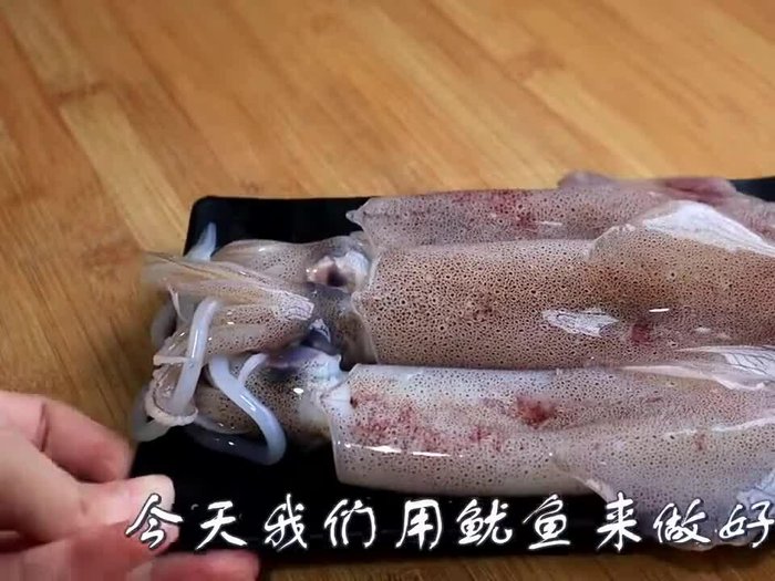 Prepare the squid: Clean and cut the squid into rings or desired shapes.