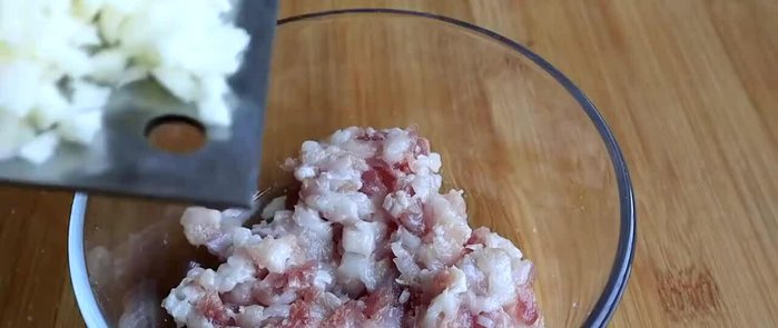 Prepare the pork filling: Mix ground pork with soy sauce, sugar, cooking wine, minced ginger, garlic, and chopped scallions. Add other spices to taste.