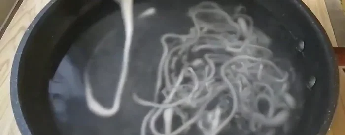 Pour the prepared sauce over the noodles.