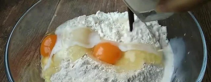 Mix the flour, milk, yeast, sugar, salt, and baking powder.