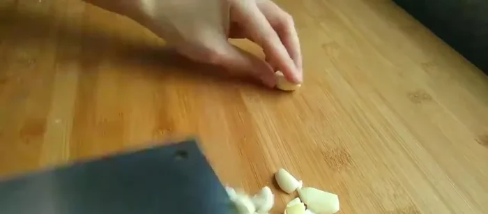 Add garlic and ginger, stir-frying until fragrant.