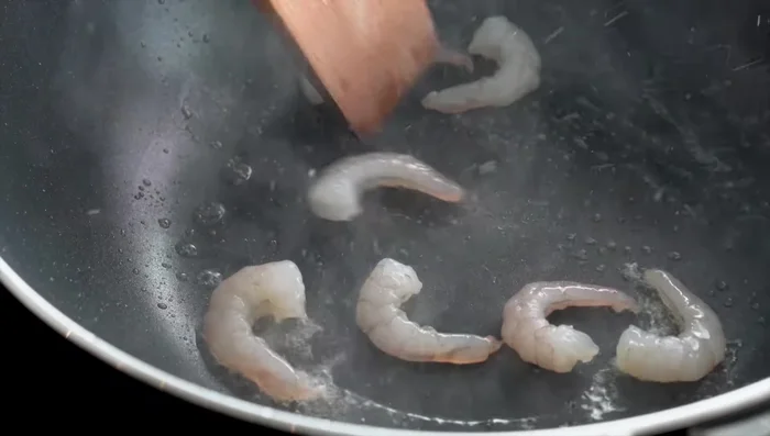 Stir-fry until noodles are coated in the sauce and heated through.