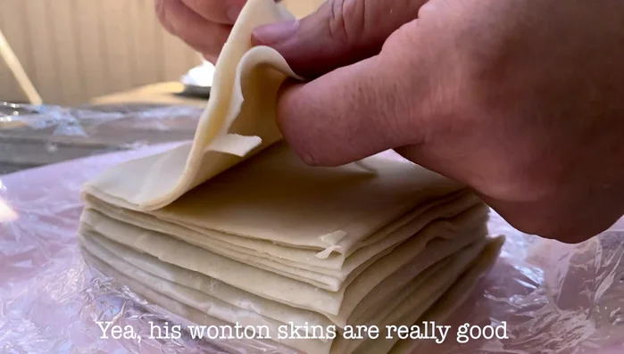Prepare the wonton wrappers using flour and water (similar to ravioli skin). (126.399)