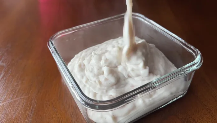 Pour the mixture into a mold, tapping out air bubbles and smoothing the top.