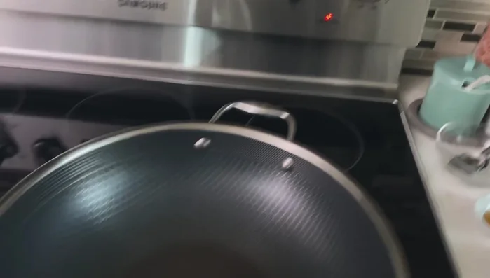 Heat oil in a wok or nonstick pan until very hot. Add cornstarch to the pork chops just before frying.