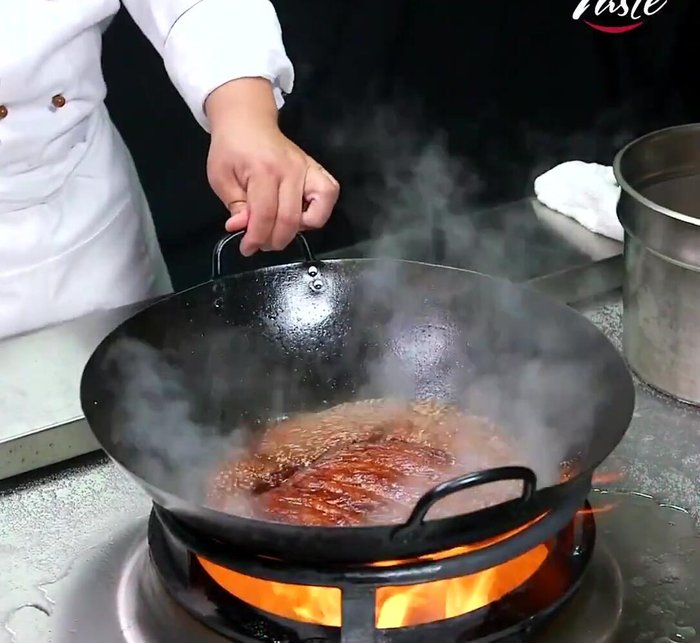 Check for doneness: The ribs are done when they are tender and the internal temperature reaches 200-205°F (93-96°C).
