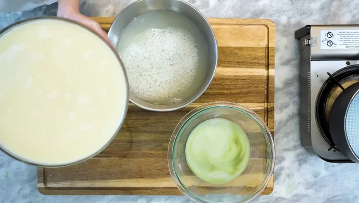 Carefully pour out most of the liquid, leaving the starch at the bottom. Stir the starch mixture well.
