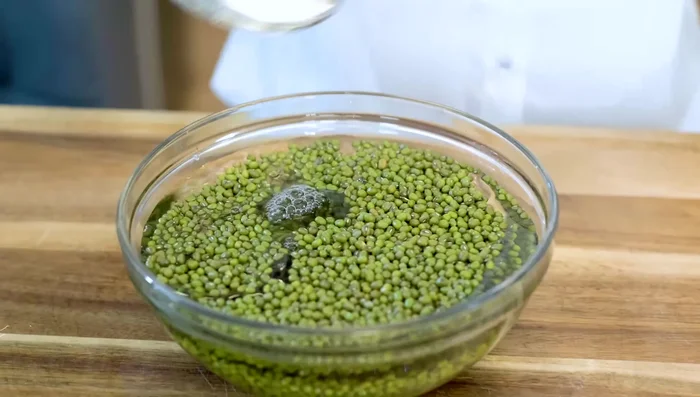 Rinse the soaked beans and discard the soaking water. Blend the beans with some water until as fine as possible.
