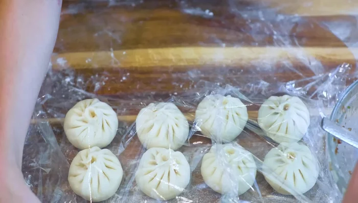 Let the assembled buns prove for 15 minutes, covered.
