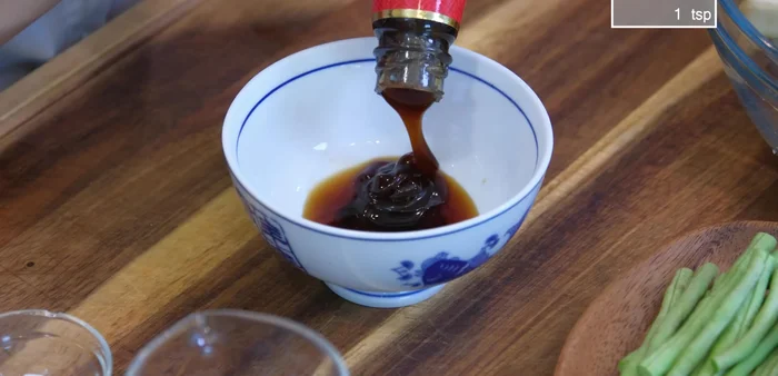 Make stir-fry sauce: Combine soy sauce, oyster sauce, dark soy sauce, white pepper, tapioca starch, and water. Stir well.