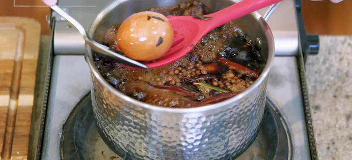 Gently tap each egg to create cracks in the shell (important for flavor infusion).