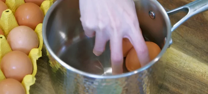Take eggs out of the fridge 30 minutes before cooking to reach room temperature.