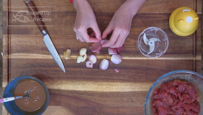 Prepare aromatics: Mince shallot, garlic, and ginger.