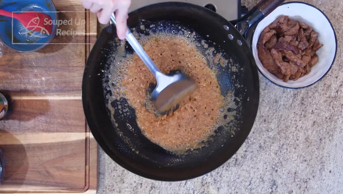 Cook sauce: Pour sauce into wok, mix and allow flavors to infuse. Add water/beef stock thickened with potato starch/cornstarch. Stir until thickened. Add more dark soy sauce for deeper color.