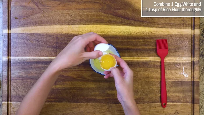 Prepare egg and rice flour mixture for chicken.