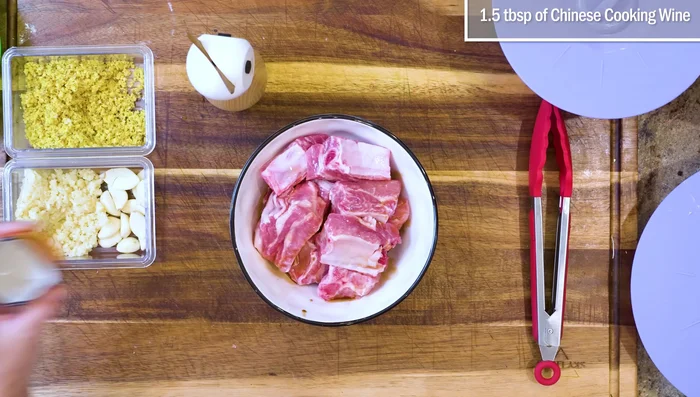 Marinate ribs (soy sauce, Chinese cooking wine, minced garlic, minced ginger, black pepper). Refrigerate.