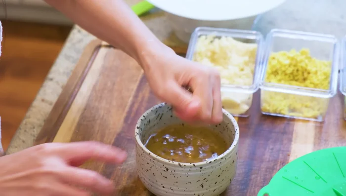 Prepare the mushroom filling for the bitter melon.