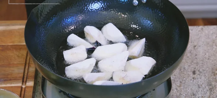 Deep fry eggplant in 380°F oil, skin-side down, until cooked through, about 1-2 minutes per batch.