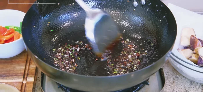 Add the sauce and stir for 1 minute. Pour in the cornstarch water, stir until thickened.