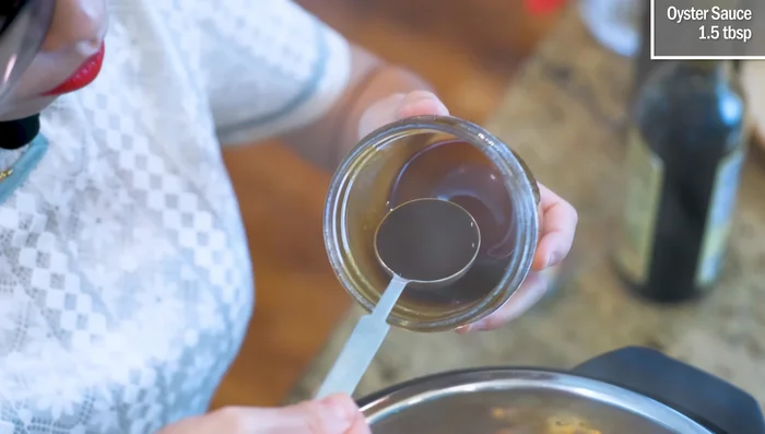 Add soy sauces and stir until bubbling; caramelize for flavor.