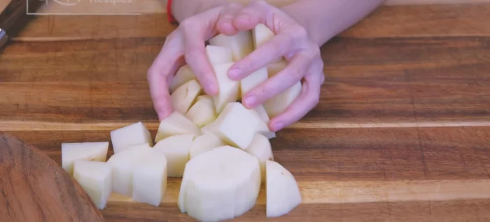 After 2.5 hours, remove the scallions and ginger. Check the tenderness of potatoes and adjust seasoning if needed. Simmer for another 30 minutes.